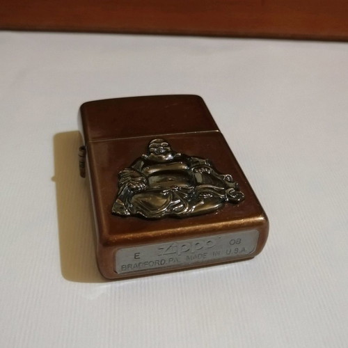 Zippo lighter used, bronze with applique Buddha design