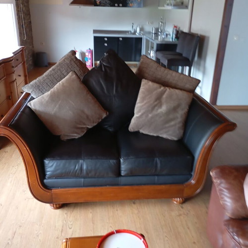Leather couch like new with wooden frame and cushions included