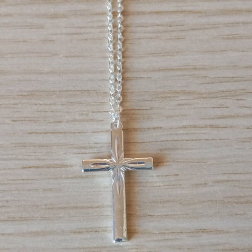 Steel cross like new, silver color