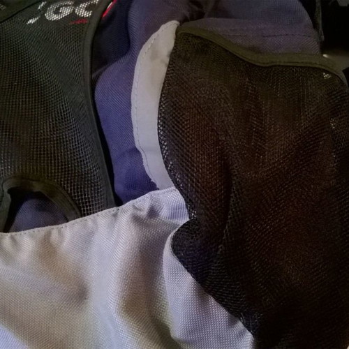 Backpack used with pockets and rain protection