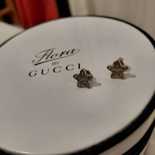 Guess star earrings like new, gold tone