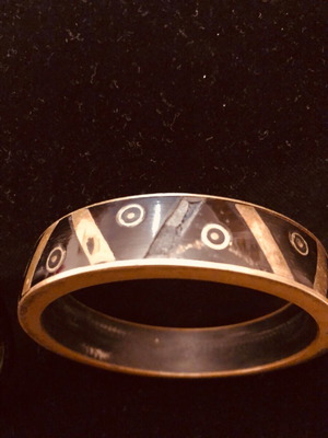 Bracelets like new, set of 4, white, black, cream with gold and Indian design