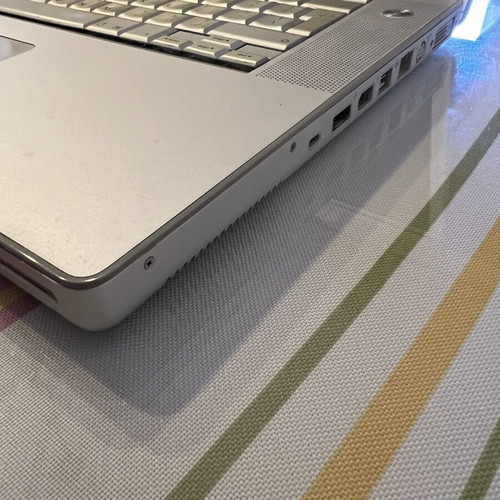 Apple PowerBook G4 15-inch laptop with original charger