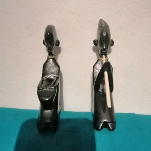 Ebony woodcarving set used, two African figures playing musical instruments