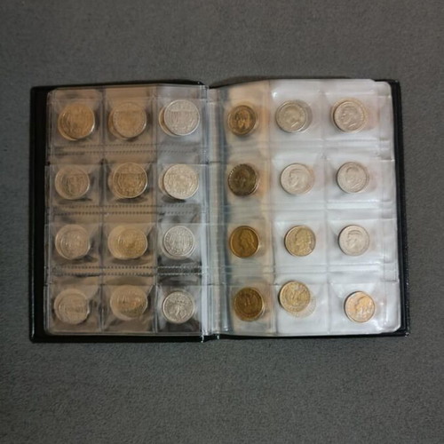 Album of 120 collectible coins from 7 countries