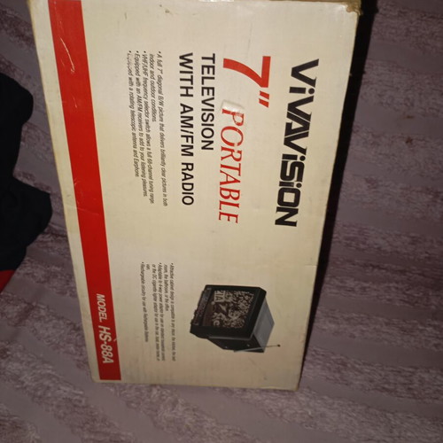 Vintage portable black and white television with radio like new