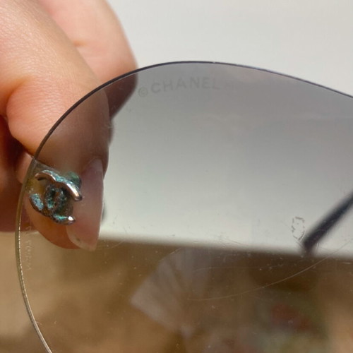Chanel rimless sunglasses used with scratches on lenses