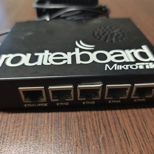 MikroTik RouterBOARD RB450Gx2 Gigabit Router used with power supply