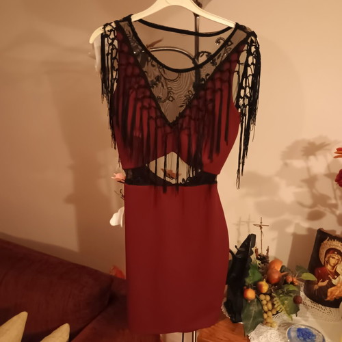 Midi dress for special occasions like new, burgundy with lace and fringes