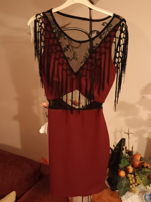 Midi dress for special occasions like new, burgundy with lace and fringes