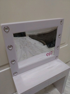 Our Generation Glam & Glow Light-up Vanity Table used for dolls
