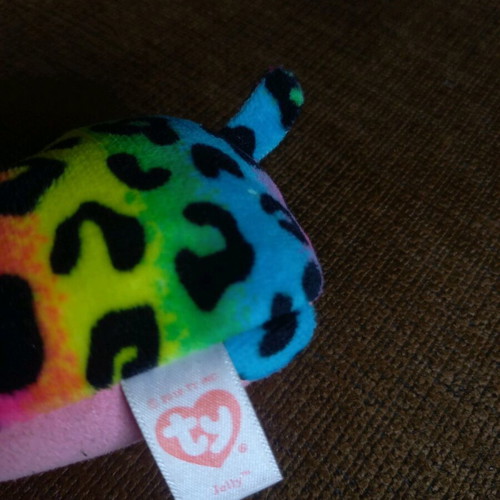 Colorful teddy bear doll like new