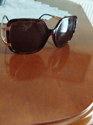 Spitfire brown sunglasses with gold frame used