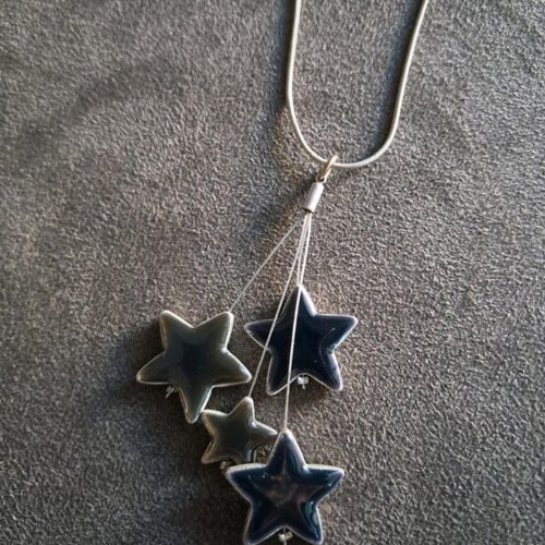 Necklace with chain like new with star design in blue-gray color
