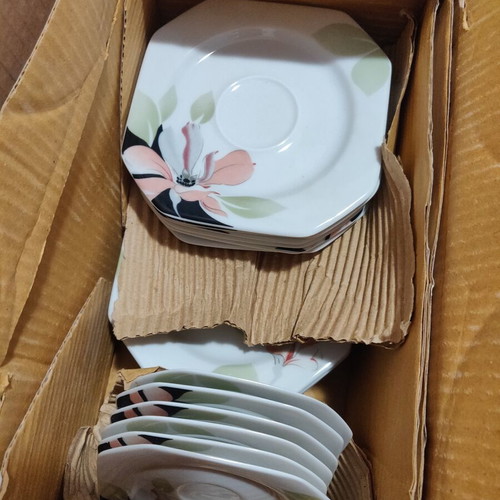 Set of cups and jugs used with lids and saucers