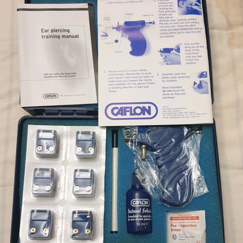 Caflon Blu ear piercing set new, complete