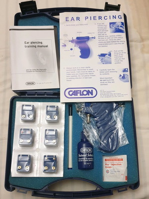 Caflon Blu ear piercing set new, complete