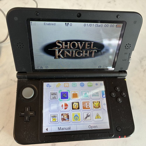 Nintendo 3DS XL Super Smash Bros. Limited Edition used console with 5 games