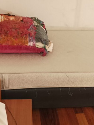 Single mattress used 1.10x2.00 with black fabric upholstered base