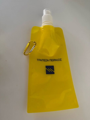 Water or electrolyte pouch new by Piraeus Bank plastic flask with belt ring