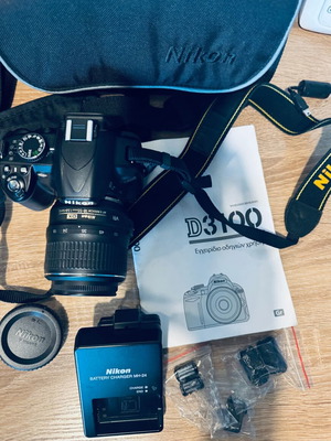 Nikon D3100 DSLR kit used with 18–55mm VR lens and bag