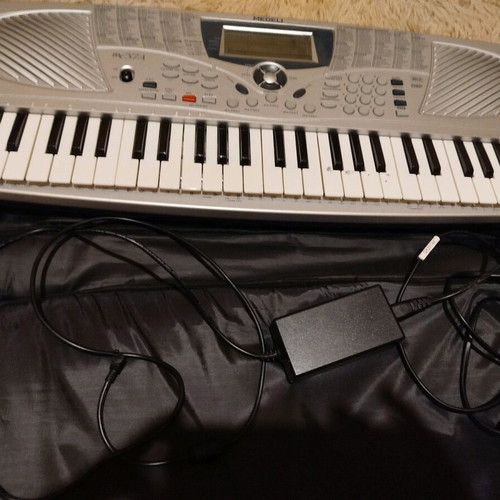 Medeli MC37A electronic keyboard used with case