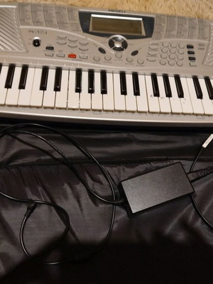 Medeli MC37A electronic keyboard used with case