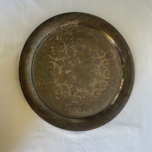 Large serving tray used with Arabic design and patina