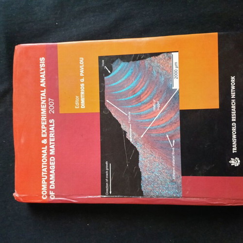 Computational & Experimental Analysis of Damaged Materials book like new with signature