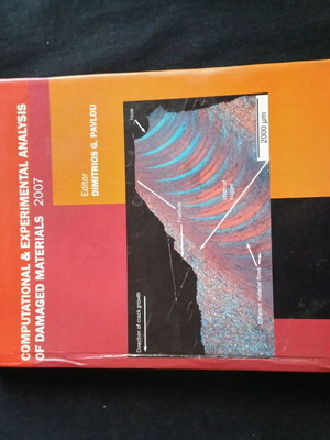 Computational & Experimental Analysis of Damaged Materials book like new with signature
