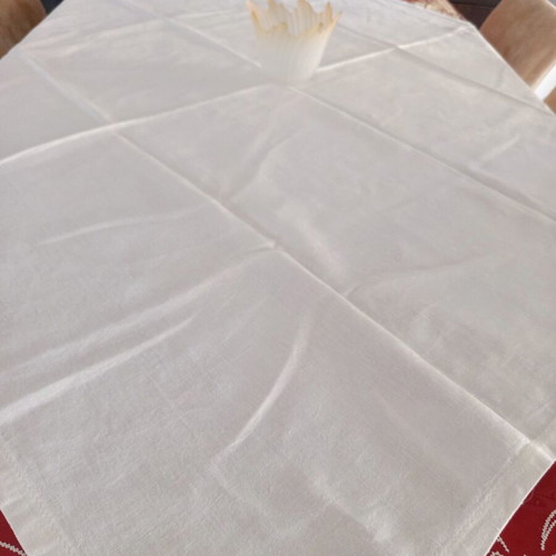 Handmade white jacquard tablecloth with embossed designs like new