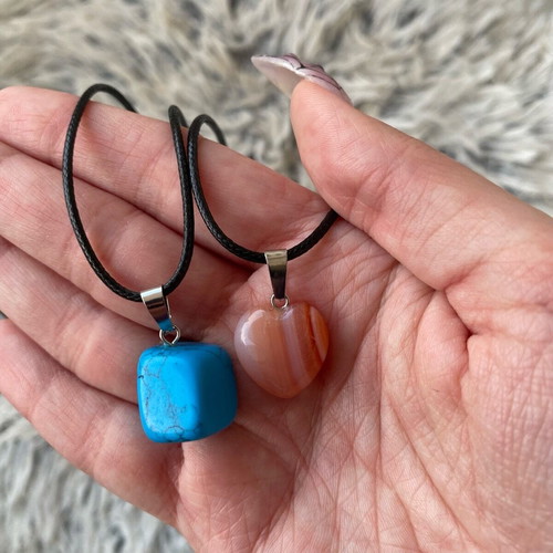 Pack of two crystal necklaces new with black cord unisex