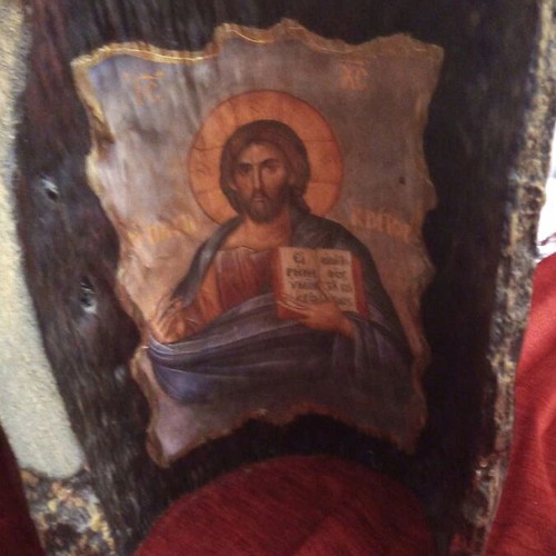 Christ image on tree trunk like new