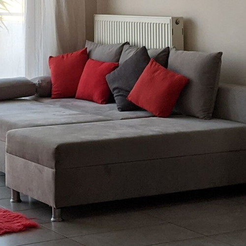 Corner sofa bed gray used with storage space