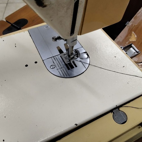 Singer sewing machine used, portable with frame damages