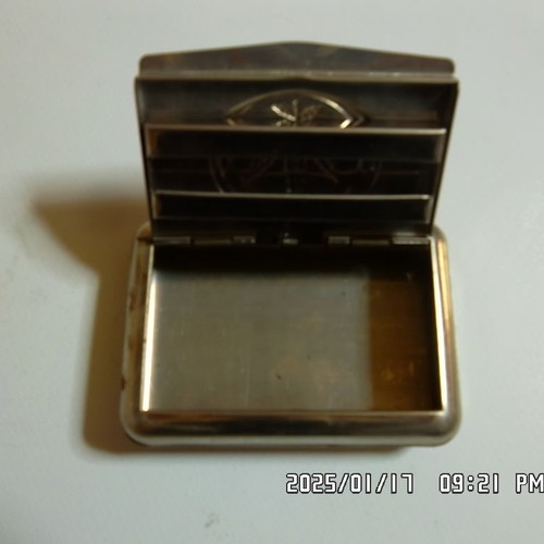 Tobacco case with paper holder used