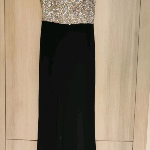 Jumpsuit official with sequins XL size, like new, black and silver