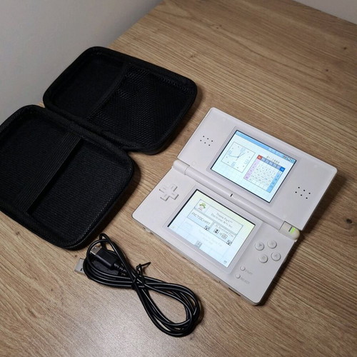 Nintendo DS Lite Polar White like new with charger and case