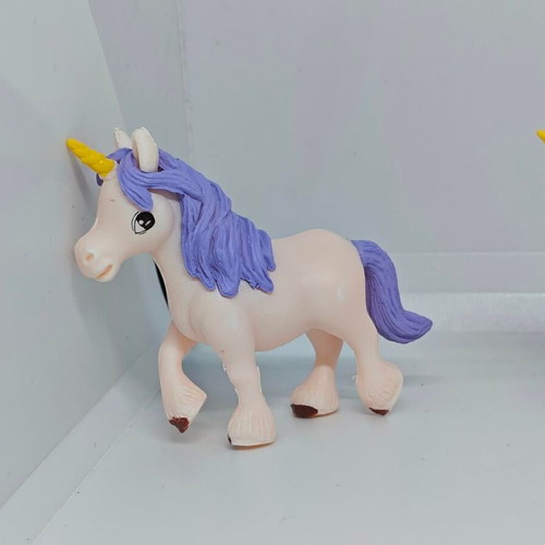 Set of 4 unicorn and pegasus figures like new