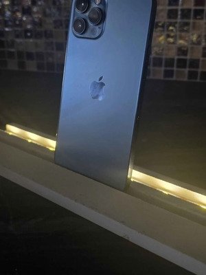iPhone 12 Pro Max like new with case, charger, and screen protector