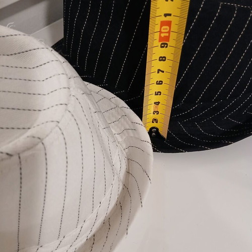 Hats like new, black and white, one size