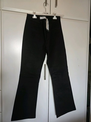 Black Mango bell-bottom pants new, size M / 38