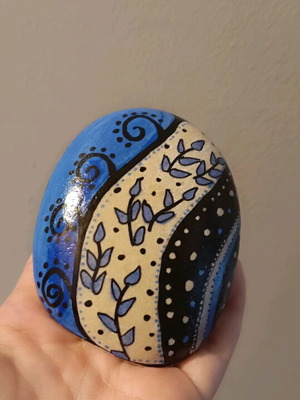 Painted stone new with acrylics and glossy varnish