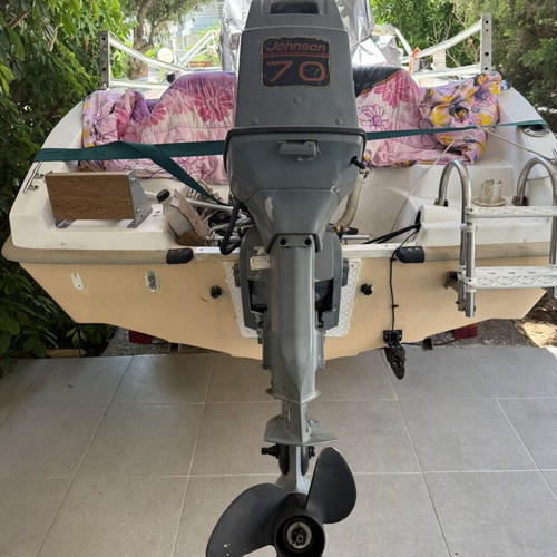 Johnson 70 hp outboard motor used with accessories