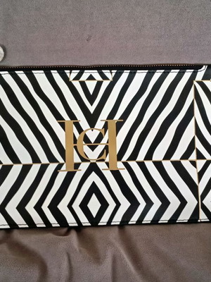 Carolina Herrera toiletry bag new, black and white
