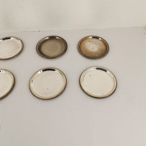 Set of 8 used metal coasters