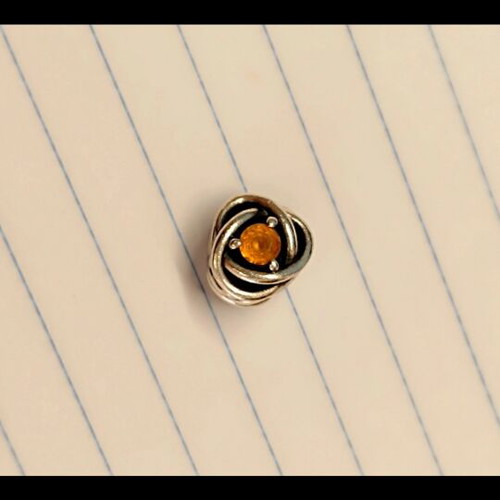 Pandora Honey Eternity Circle Charm with honey-colored stone