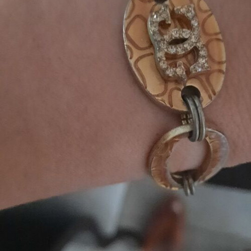 Guess vintage beige gold bracelet with rings and logo strass used