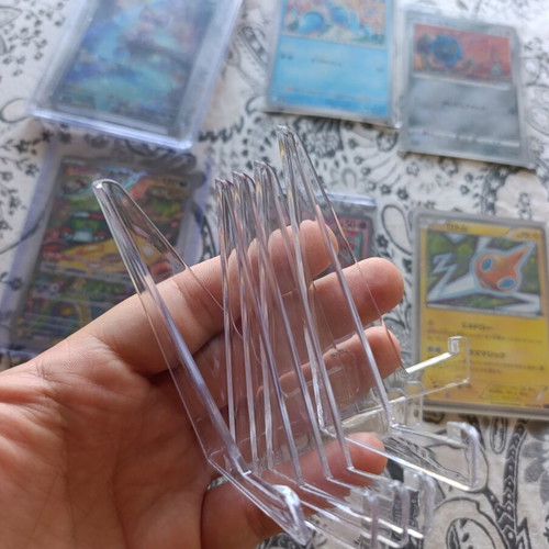 Japanese Pokemon TCG cards with 5 card stands