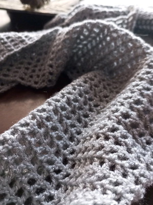 Handmade silver knitted scarf new with subtle shine